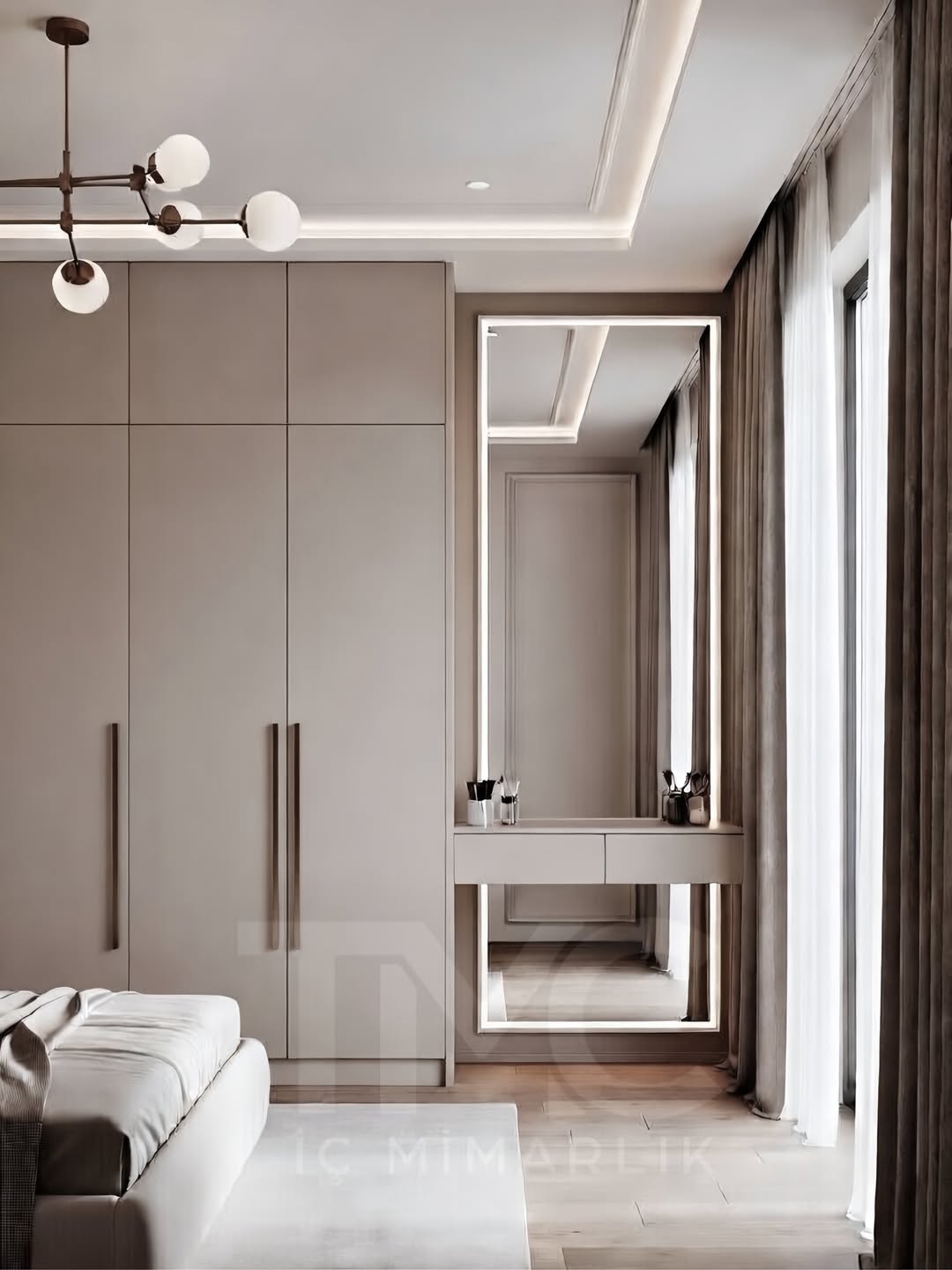 Modern giyinme alanı tasarımında vizon renk paleti, gizli kulp detayları ve LED aydınlatmalı makyaj alanı ile estetik ve fonksiyonel çözümler bir araya getirildi.