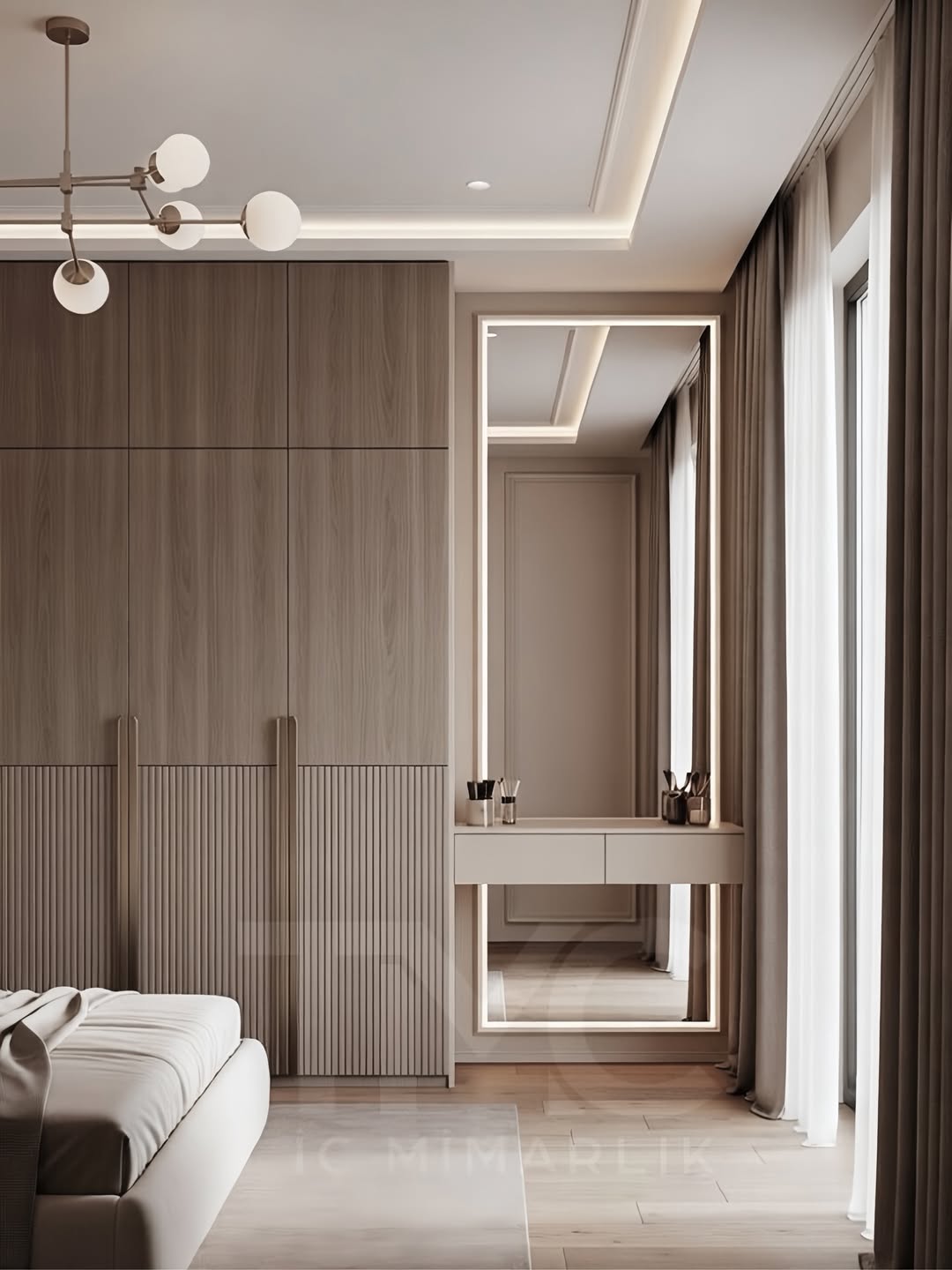 Modern giyinme alanı tasarımında vizon renk paleti, gizli kulp detayları ve LED aydınlatmalı makyaj alanı ile estetik ve fonksiyonel çözümler bir araya getirildi.