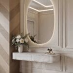 Modern antre tasarımı, kemer formunda LED aydınlatmalı ayna, bej tonlarında lake konsol, duvar panel detayları ve minimal dekorasyon ile şık ve ferah giriş alanı, modern iç mimari antre modeli, İstanbul özel ölçü antre mobilyası.