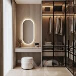 Modern giyinme odası ve makyaj masası tasarımı, ölçüye özel dolap sistemi, entegre LED aydınlatmalı ayna, açık ton modern iç mimari, minimal kapaklı gardırop ve fonksiyonel depolama çözümleri – TMC Mimarlık