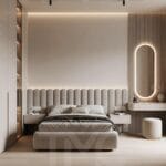 Modern yatak odası tasarımı, ölçüye özel panel duvar uygulaması, soft krem ve bej tonlarında minimal dekorasyon, gizli LED aydınlatmalı duvar paneli, entegre makyaj masası ve yuvarlak aydınlatmalı ayna, modern iç mimari yatak odası çözümü.