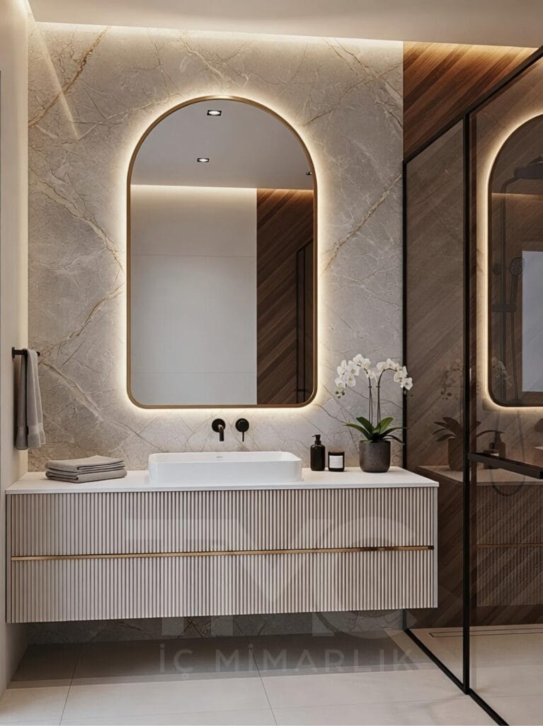 modern banyo tasarımı, mermer görünümlü kaplama, gizli led aydınlatmalı ayna, cam duş paneli, minimal banyo dolabı, kadıköy iç mimari proje, lüks modern banyo dekorasyonu