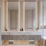 Limonlu Bahçe Konakları’nda tasarlanan modern banyo projesi; mermer tezgâh, arka aydınlatmalı aynalar ve minimal tasarım detayları ile lüks ve ferah bir iç mekân sunmaktadır.