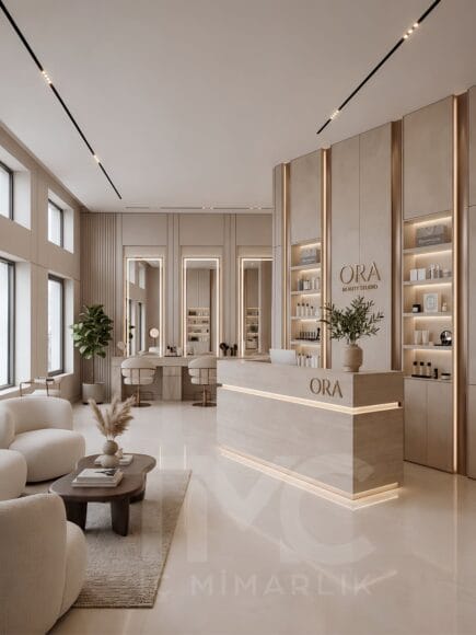Modern güzellik salonu tasarımında sıcak bej tonları, bronz detaylar, doğal taş yüzeyler ve lineer LED aydınlatmalar ile premium bir spa atmosferi oluşturduk.