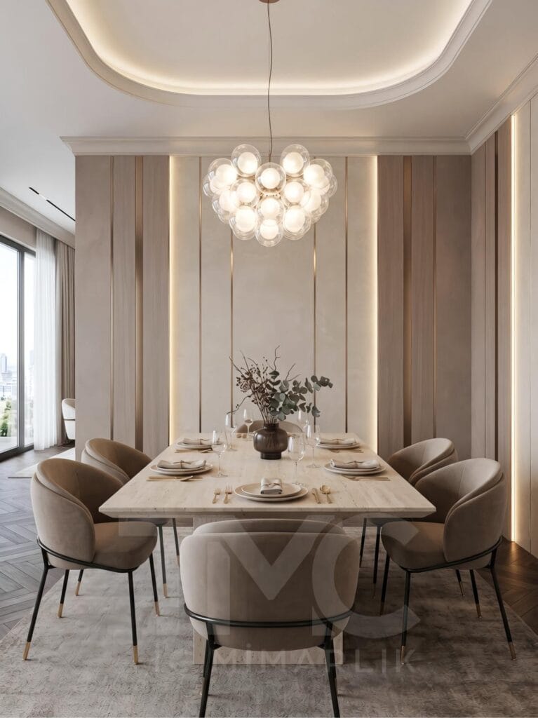 Modern salon ve yemek odası tasarımı, Soyak Yenişehir Emir Bey projesi, krem tonlarında modern iç mimari, doğal taş detaylı salon tasarımı, sıcak LED aydınlatmalı yaşam alanı, modern yemek odası dekorasyonu, özel tasarım TV ünitesi, dekoratif duvar paneli uygulaması, lüks salon iç mimari tasarımı, TMC Mimarlık modern yaşam alanı projesi, premium salon dekorasyonu, modern daire iç mekan tasarımı, ahşap detaylı salon konsepti, contemporary living room design, luxury dining room interior, modern Turkish interior design.