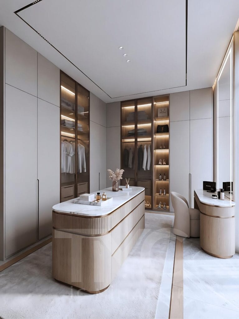 Nish Adalar’da tasarlanan modern giyinme odası projesi. Bronz nervür cam kapaklar, özel üretim ada ünitesi, LED aydınlatmalı makyaj alanı ve doğal ahşap detaylarla tasarlanan lüks giyinme odası dekorasyonu. Modern dolap sistemleri, premium iç mimari detaylar ve fonksiyonel depolama çözümleriyle tasarlanmış özel yaşam alanı.