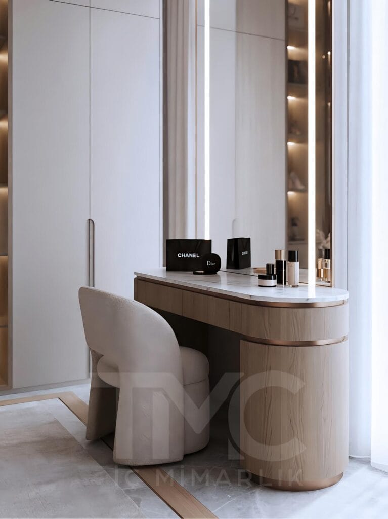 Nish Adalar’da tasarlanan modern giyinme odası projesi. Bronz nervür cam kapaklar, özel üretim ada ünitesi, LED aydınlatmalı makyaj alanı ve doğal ahşap detaylarla tasarlanan lüks giyinme odası dekorasyonu. Modern dolap sistemleri, premium iç mimari detaylar ve fonksiyonel depolama çözümleriyle tasarlanmış özel yaşam alanı.