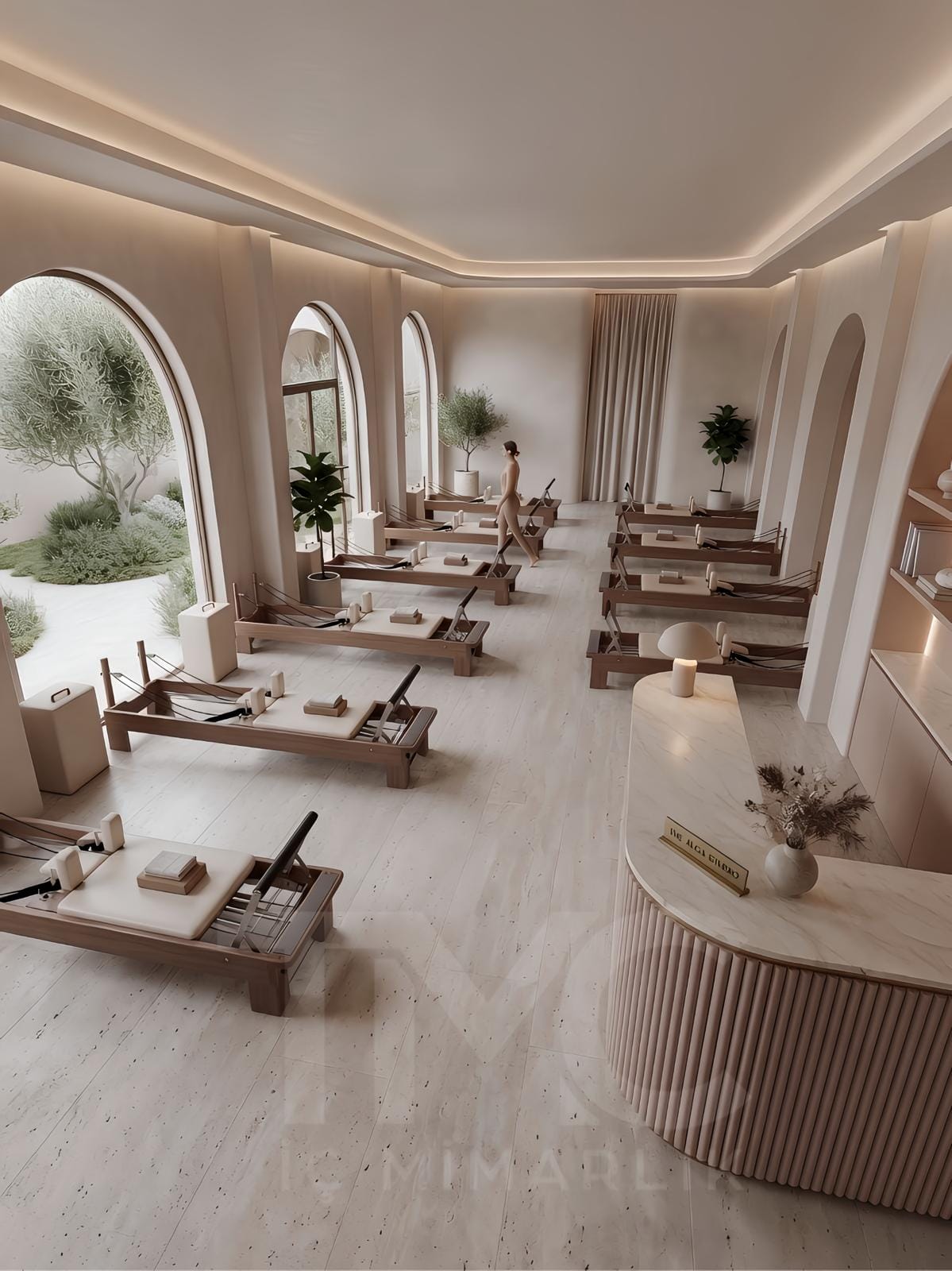 Modern pilates stüdyosu iç mimari tasarımı, doğal tonlarda butik pilates salonu dekorasyonu, kemerli mimari detaylı wellness studio tasarımı, sıcak LED aydınlatmalı pilates alanı, modern karşılama bankosu ve bekleme alanı tasarımı, açık bej renk paletli premium spor stüdyosu iç mekanı, TMC Mimarlık özel pilates stüdyosu projesi.