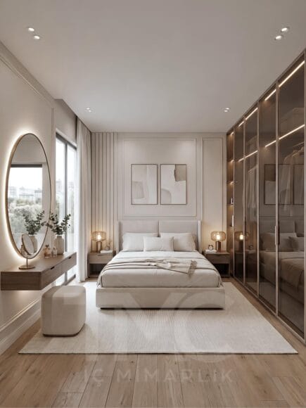 Modern yatak odası tasarımı, bronz reflekte cam gardırop sistemi, LED aydınlatmalı açık raf detayları, oval LED makyaj aynası ve doğal ahşap dokular ile tasarlanmış lüks yatak odası projesi. Ritim İstanbul’da TMC Mimarlık tarafından uygulanan modern yatak odası dekorasyonu, açık tonlu duvar panelleri, sıcak LED aydınlatmalar ve ölçüye özel depolama çözümleriyle sade ve premium bir yaşam alanı sunuyor.